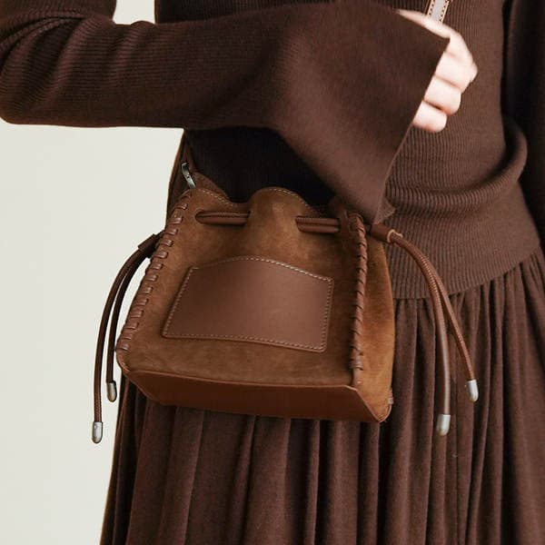 Niche Design Matte Cowhide Drawstring Bucket Bag Genuine Leather Textured Pleated Shoulder Crossbody Bag For Women
