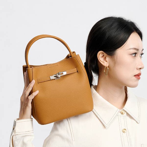 New Women's Genuine Leather Bucket Bag - Fashionable Commuter Versatile Designer Niche Crossbody Handbag