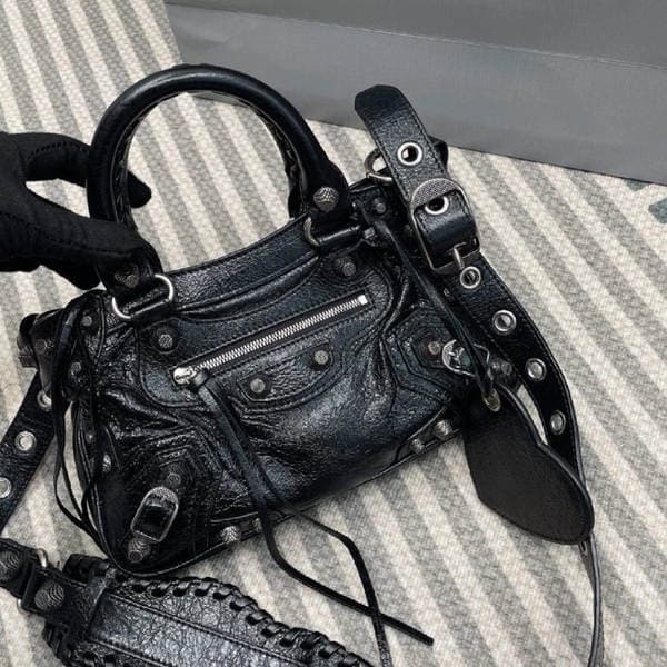 2025 New Handheld Tote Biker Bag Underarm Bag Studded Tassel Cracked Grain Pleated Cowhide Shoulder Crossbody Bag For Women