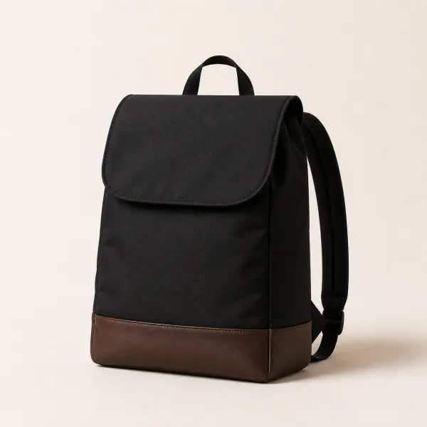 Minimalist black nylon backpack with leather base