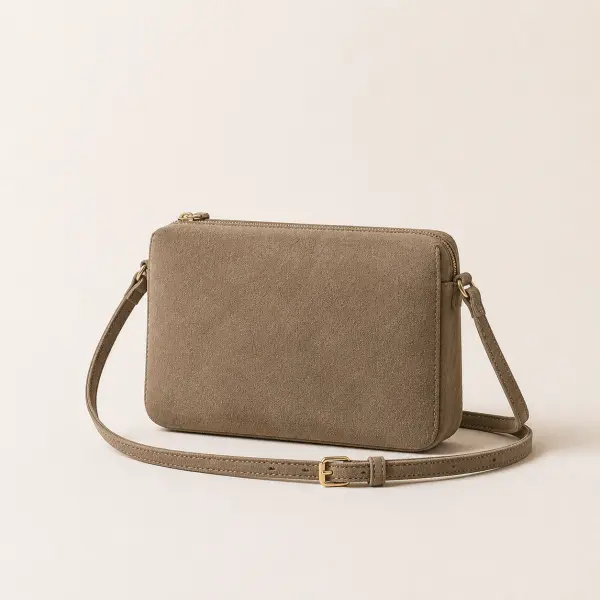 Taupe suede crossbody bag with a long strap